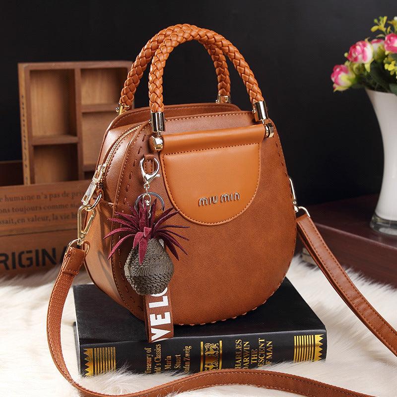 Leather handbag - stylish women's shoulder bag with decorative detail