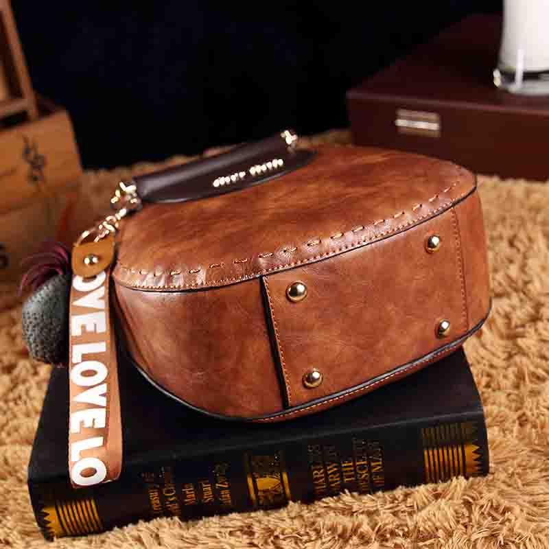 Leather handbag - stylish women's shoulder bag with decorative detail