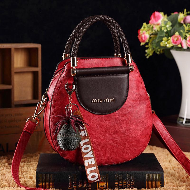 Leather handbag - stylish women's shoulder bag with decorative detail