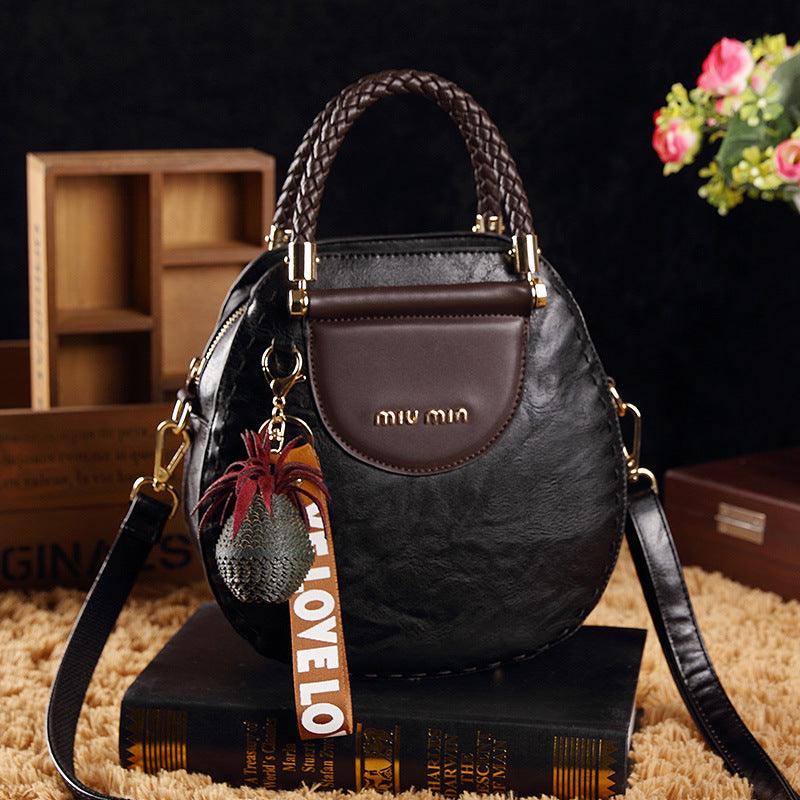 Leather handbag - stylish women's shoulder bag with decorative detail