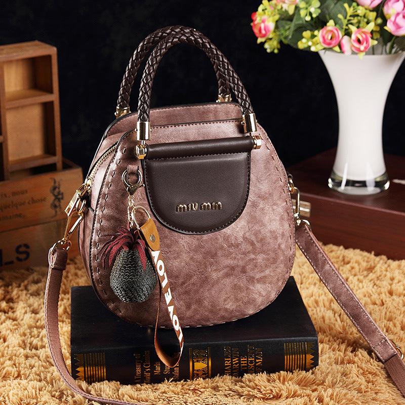 Leather handbag - stylish women's shoulder bag with decorative detail